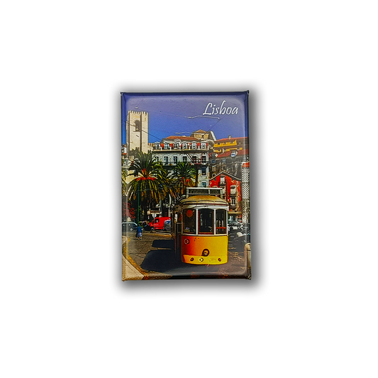 The New Jamp Lisbon Tram, Figueira - Fridge Magnet features a vibrant tram on a sunny Lisbon street with palm trees and historic buildings, plus a Barcelos Rooster and "Lisboa" in white at the top, making a charming Portugal souvenir.