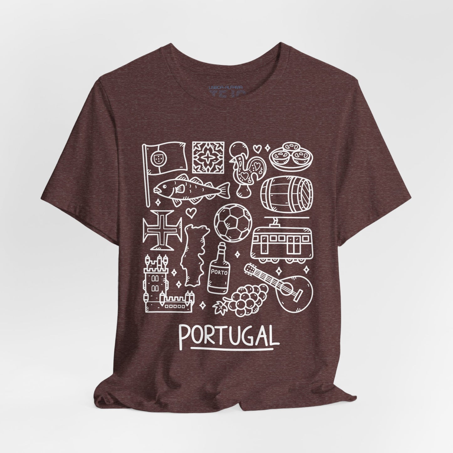 The Portuguese Doodles Jersey, designed by Printify, is a maroon unisex short sleeve tee made from soft cotton. It features intricate white line drawings of various Portuguese icons, such as a fish, soccer ball, tram, guitar, wine barrel, castle, map of Portugal, and other cultural symbols. The word "PORTUGAL" is prominently displayed at the bottom.