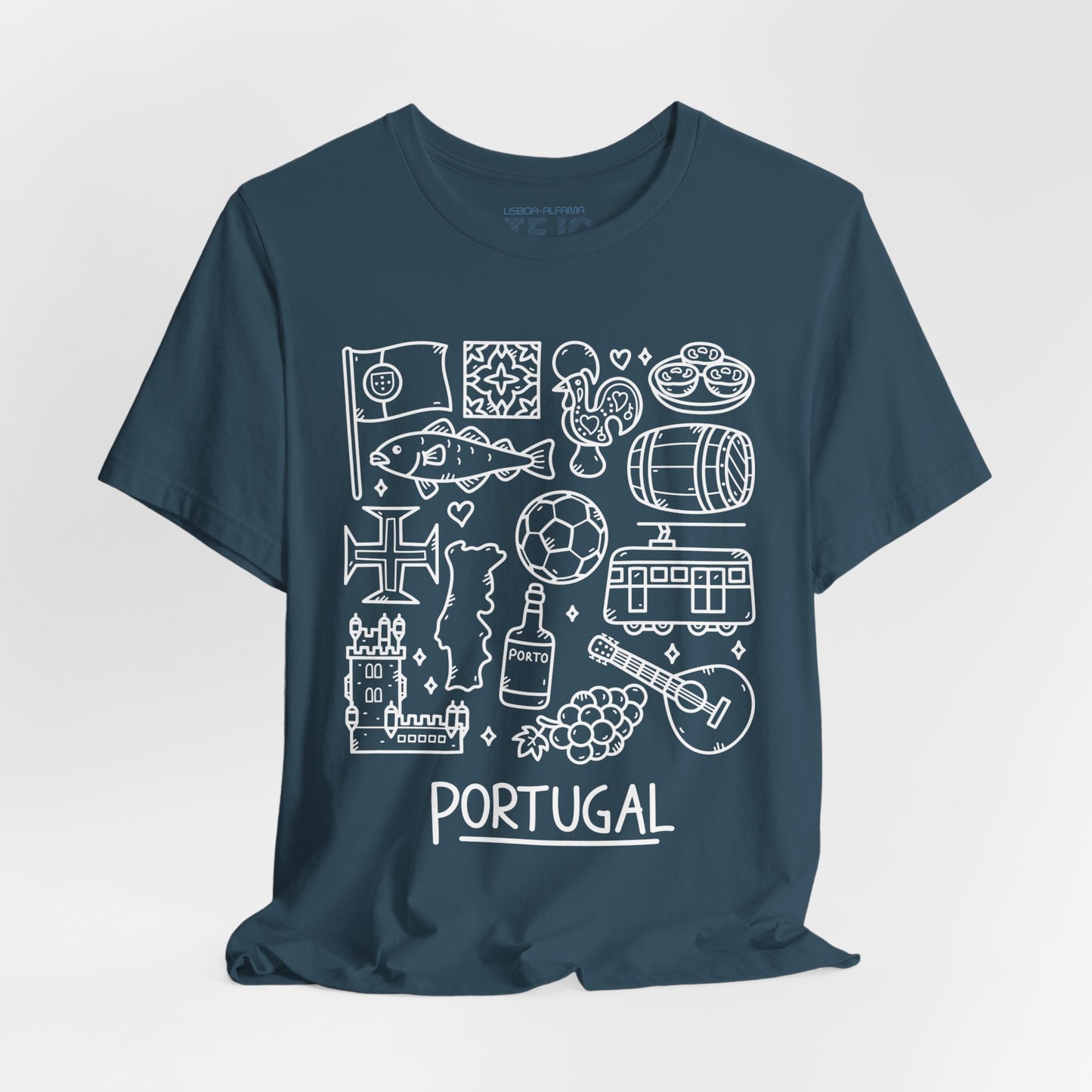 The Portuguese Doodles Jersey by Printify is a dark blue, unisex tee adorned with white line art illustrations representing Portugal. The lightweight fabric features intricate drawings of a fish, tiles, pastries, a tram, a guitar, a barrel, a football, and various landmarks. "PORTUGAL" is elegantly inscribed at the bottom in capital letters.