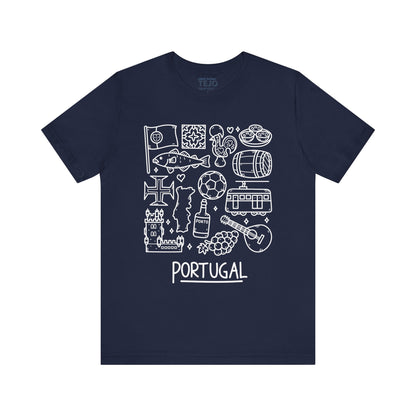 Check out the Portuguese Doodles Jersey from Printify—a navy blue unisex short sleeve tee made from soft cotton. It features white line drawings of Portuguese symbols, such as a tram, guitar, sardine, barrel, grapes, and landmarks. The word "PORTUGAL" adorns the bottom and a faint "TEJO" is printed near the neckline.