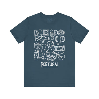 The Portuguese Doodles Jersey from Printify is a dark blue unisex tee made from Airlume cotton, featuring white line drawings that represent Portugal. These include iconic items such as a castle, fish, grapes, a guitar, a tram, pastry, sardines, a rooster, and a soccer ball. Above the illustrations is the word "PORTUGAL," written in stylized white letters.