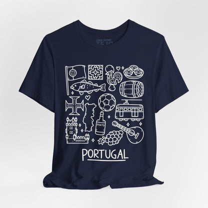 The Portuguese Doodles Jersey by Printify is a navy blue, unisex short sleeve tee made from soft cotton by Bella+Canvas. It features white line art illustrations of various Portuguese icons, including a fish, tram, guitar, castle, barrel, football, and different cultural symbols. The word "Portugal" is prominently displayed at the bottom.