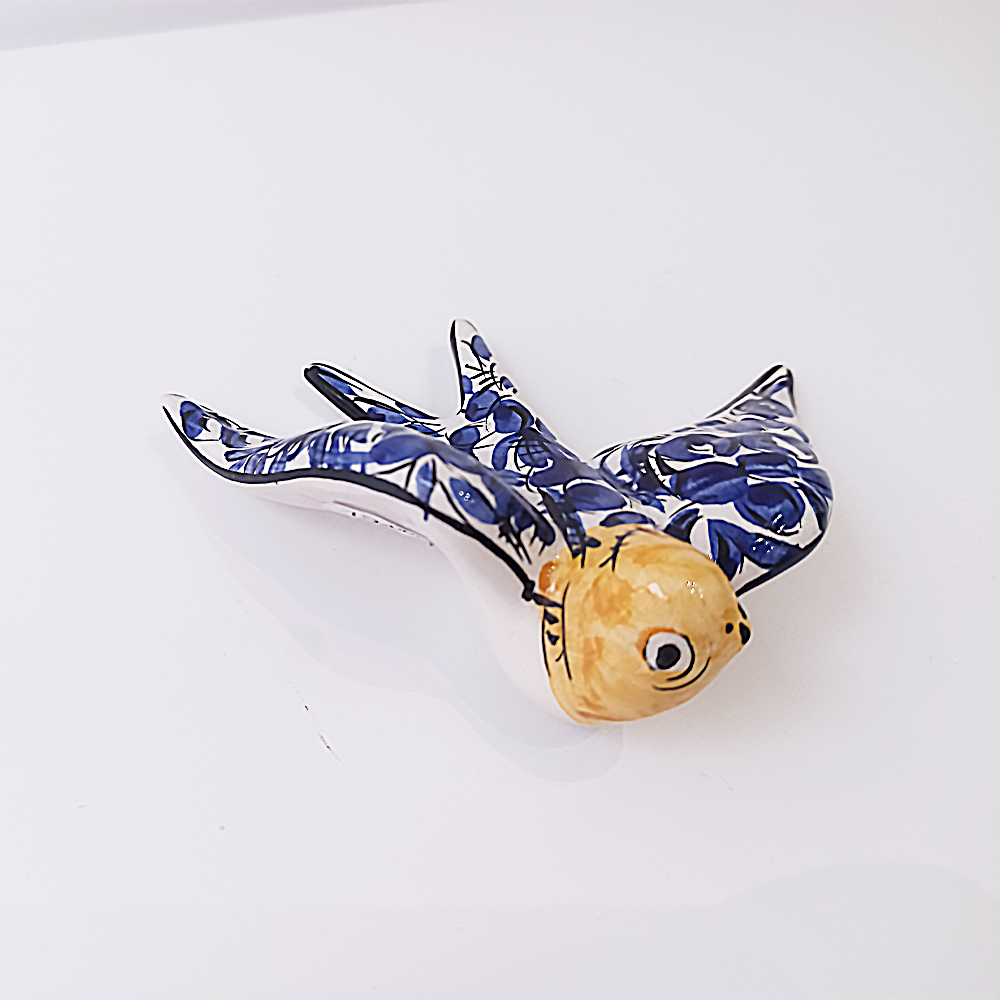 Hand-made and hand-painted Portuguese ceramic swallow. Traditional XVII theme.