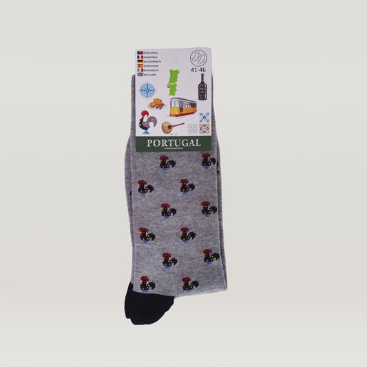 A pair of Socks - New Classic Barcelos Rooster Pattern from Tejo Shop with a cat on them.