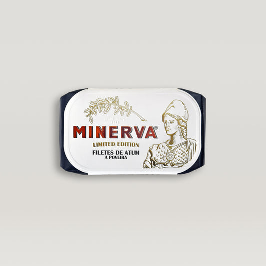 An image of a hand-tinned label with the word Minerva on it, indicating superior quality. The product is Tuna Fillets in Poveira Sauce – Limited Edition.