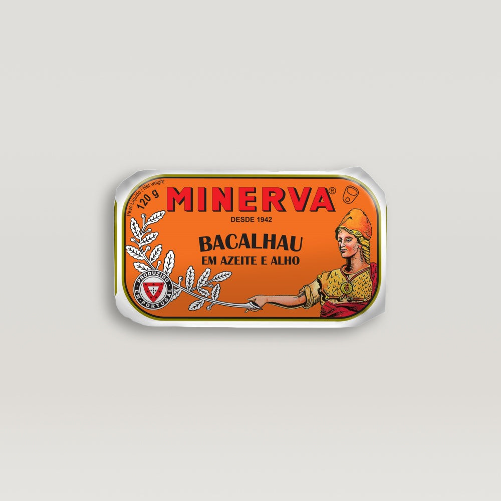 A hand-canned tin label with the word Minerva on it, containing Codfish in Olive Oil And Garlic.