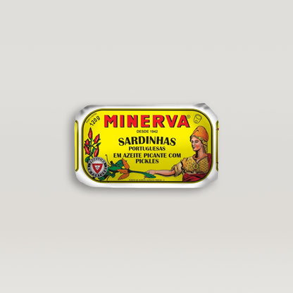 A tin of Minerva's Sardines in Spiced Olive Oil with Pickles on a white background.