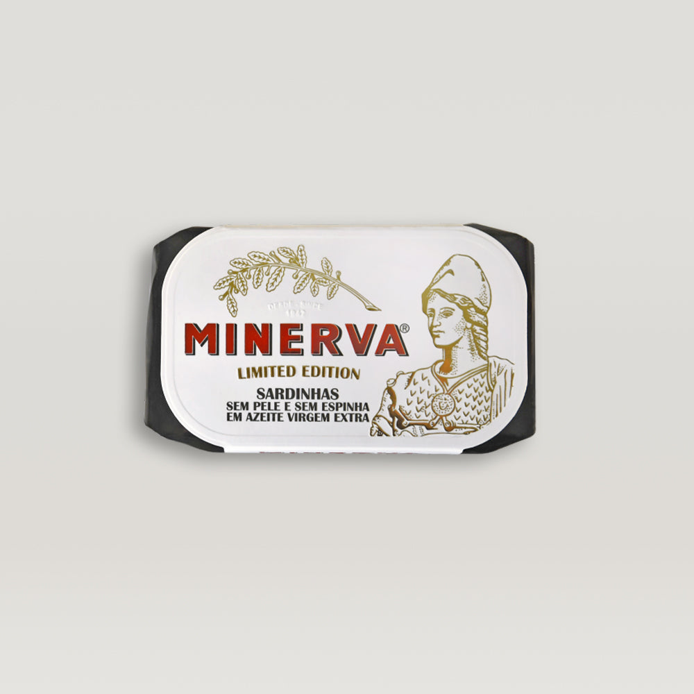 An expertly harvested Minerva label with the word "Minerva" on it, showcasing the finest Atlantic sardines preserved in extra virgin olive oil - Skinless and Boneless Sardines in Extra Virgin Olive Oil – Limited Edition.