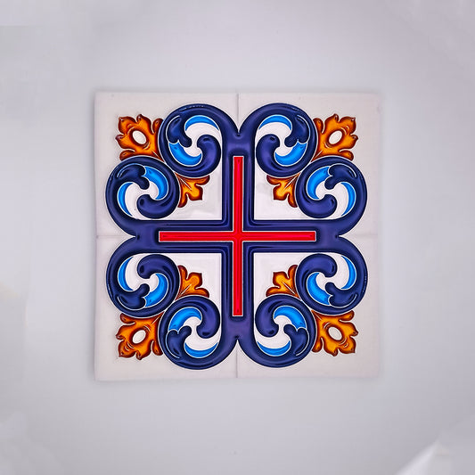A decorative Cruzade Ceramic Tile from Tejo Shop featuring a symmetrical design with a blue and orange motif, centered around a red cross, on a white background.