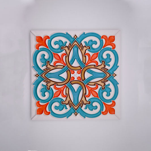 Decorative Algarve Decor Tiles featuring a symmetrical pattern with turquoise, orange, and beige designs on a white background. The design includes intricate floral and geometric shapes on hand-painted ceramic tiles from Tejo Shop.