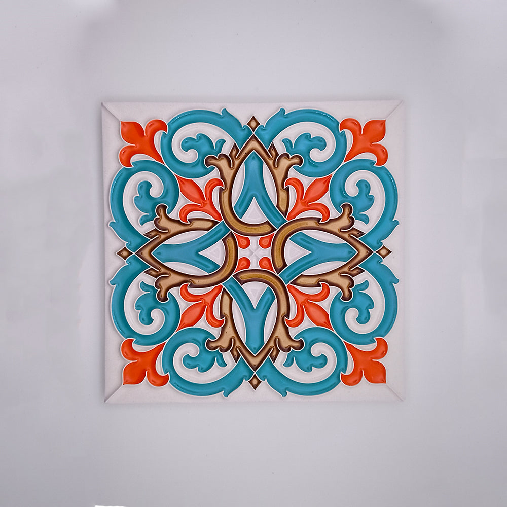 Decorative Algarve Decor Tiles featuring a symmetrical pattern with turquoise, orange, and beige designs on a white background. The design includes intricate floral and geometric shapes on hand-painted ceramic tiles from Tejo Shop.