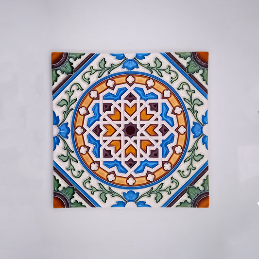 Decorative hand-painted mosaic decorative wall tiles featuring a geometric and floral pattern with a central rosette in red, blue, and green, framed by intricate borders on a white background by Tejo Shop.