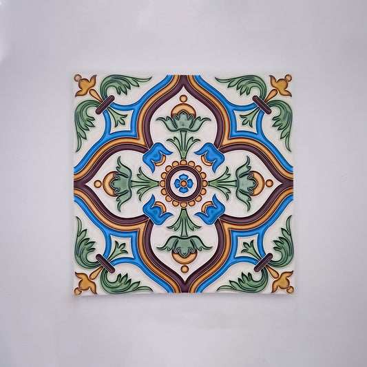 Decorative Évora Hand Painted Ceramic Tiles with a symmetrical floral design featuring green, blue, and orange colors on a white background by Tejo Shop.
