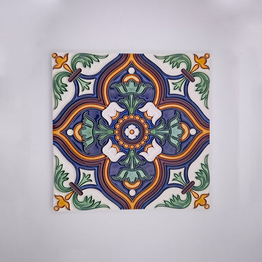Intricately painted Tejo Shop Sagres Home and Decor Tile showcasing a symmetrical floral design in vibrant blue, green, orange, and white colors with a detailed border on a white background.