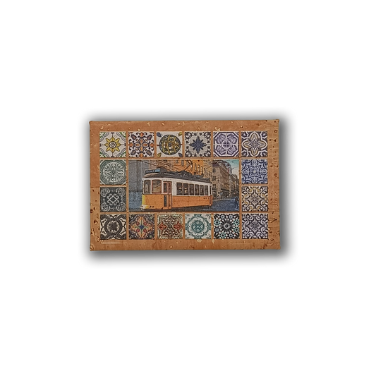 The Tiles & Tram - Cork Fridge Magnet by New Jamp features a yellow tram at its center, framed by vibrant grid patterns inspired by Portugal’s hand-painted tiles, all crafted from eco-friendly cork.