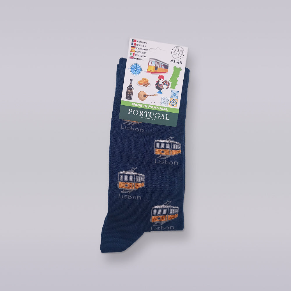 These socks, designed by Tejo Shop and crafted from premium cotton, feature an eye-catching 2D tram pattern with "Lisbon" inscribed. Packaged with pride, the label displays flags alongside the words "Portugal" and "Made in Portugal," making these Portuguese Trams socks a perfect addition to your wardrobe.