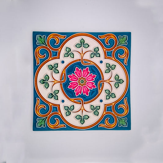 A square high-quality Portuguese Historical Ceramic Tile from Tejo Shop with a colorful symmetrical design featuring a central pink floral motif surrounded by green and blue swirls with orange accents, all set against a white background.