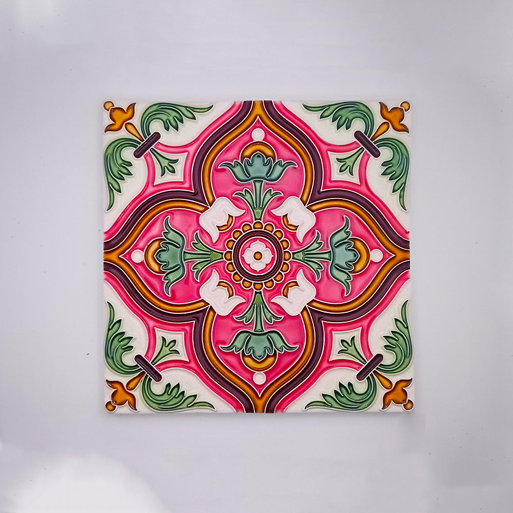 Decorative square hand-painted Spanish Tile Design featuring a symmetrical, colorful floral pattern with pink, green, and white motifs against a neutral background from Tejo Shop.