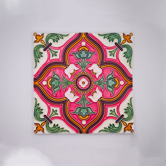 Decorative square hand-painted Spanish Tile Design featuring a symmetrical, colorful floral pattern with pink, green, and white motifs against a neutral background from Tejo Shop.